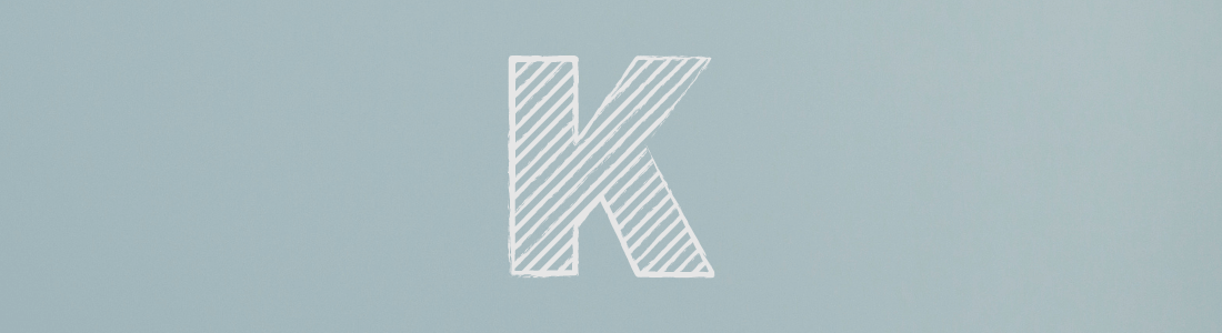 white letter K on grey background